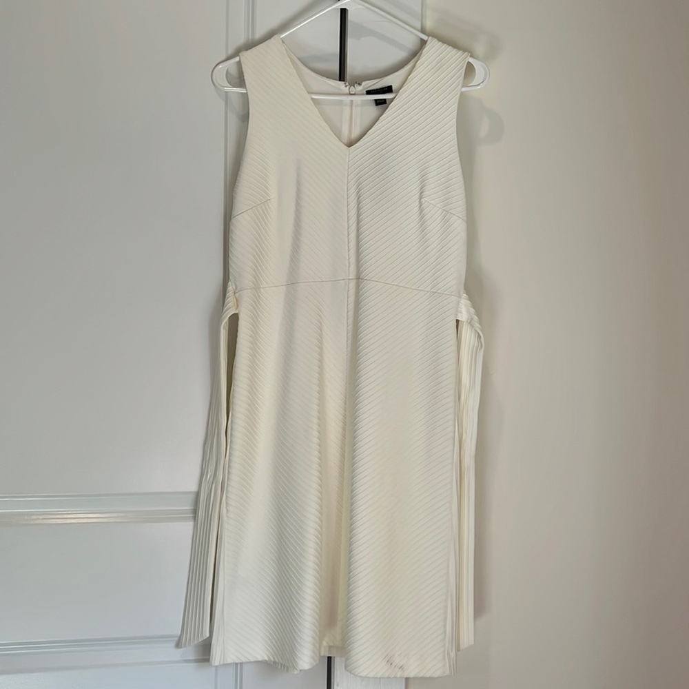 Ann Taylor cream dress size 6P.   Brand new with lining.   V neck nice material